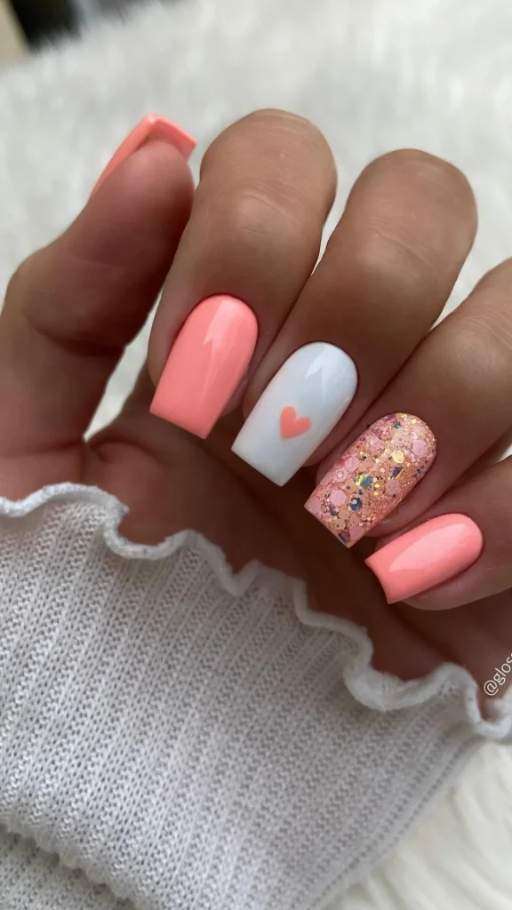 Lavender sweater inspired spring nails with daisy accents on almond tips