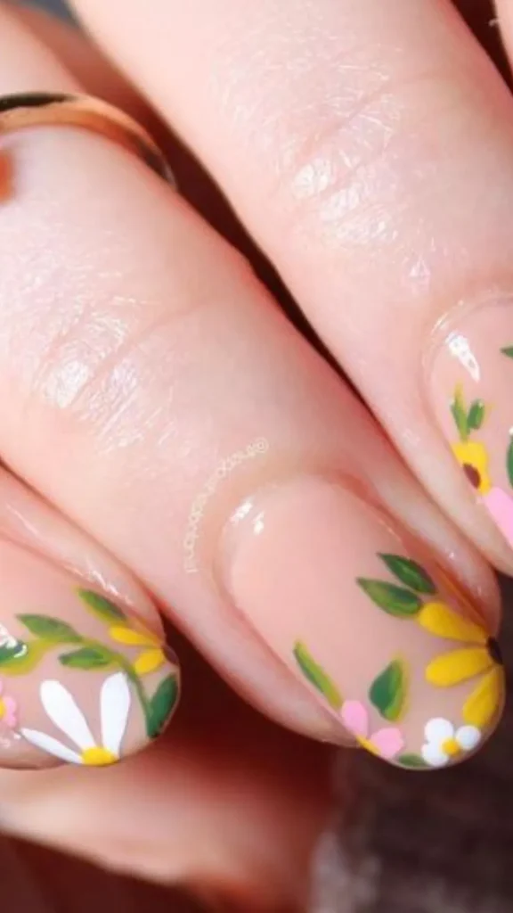 Botanical wildflower spring nails with lavender polish and detailed floral accent nails